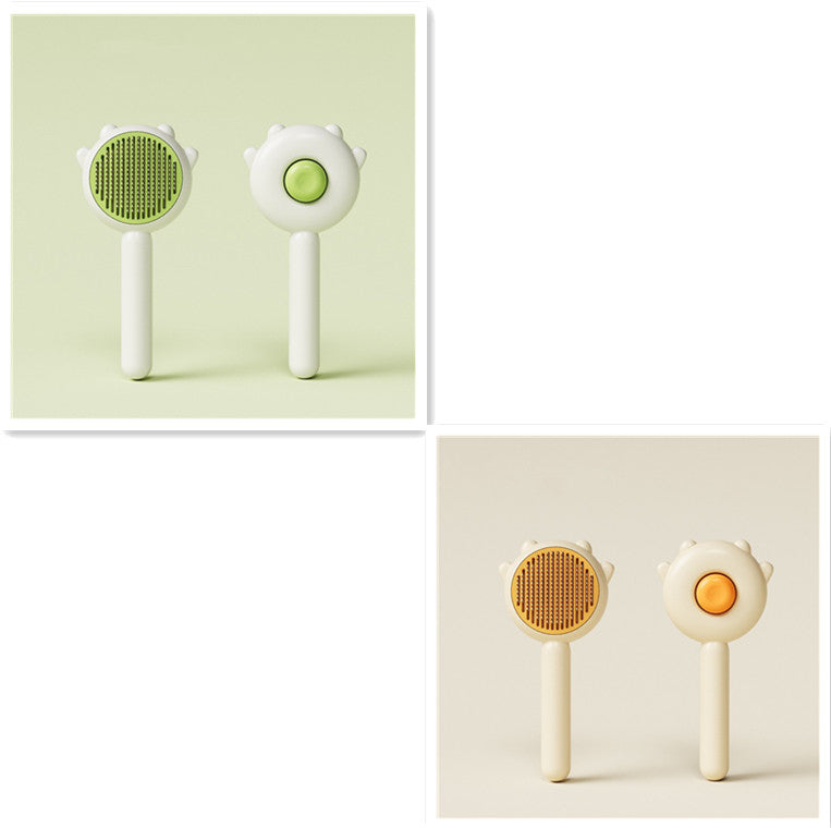 Set of two cat grooming comb brushes, green and cream, with spiked paw heads