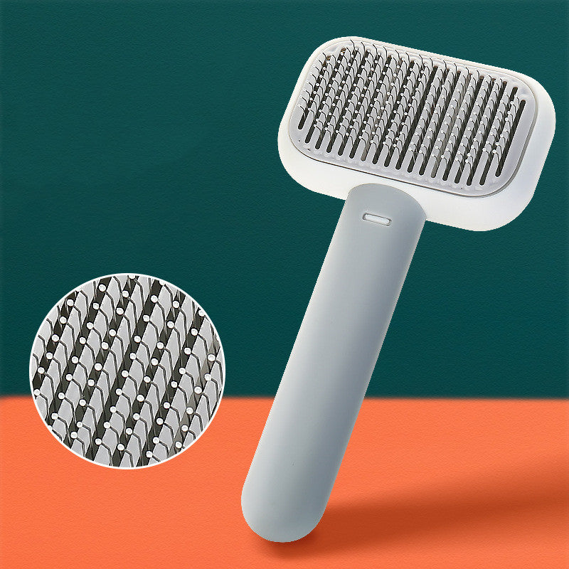 Pet grooming brush with stainless pins, white handle and white head