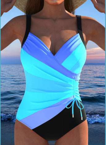 Backless drawstring tankini swimsuit with light blue and black crossed diagonal stripes
