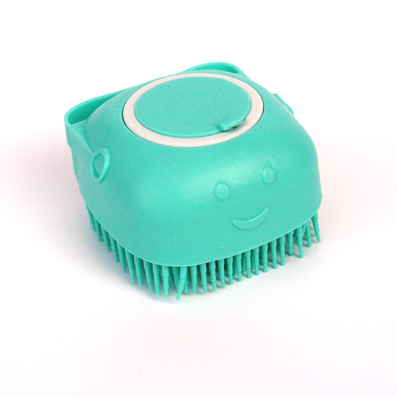 Green silicone pet bath massage brush with short bristles and gray inset ring
