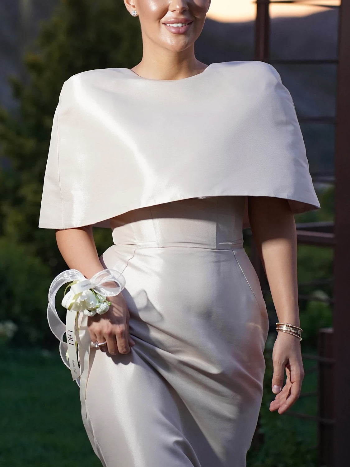 Satin cape-style top and fitted maxi dress, gathered waist seam, light ivory