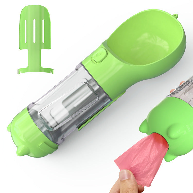 Green portable dog water bottle with stainless chamber and pink poop-bag roll