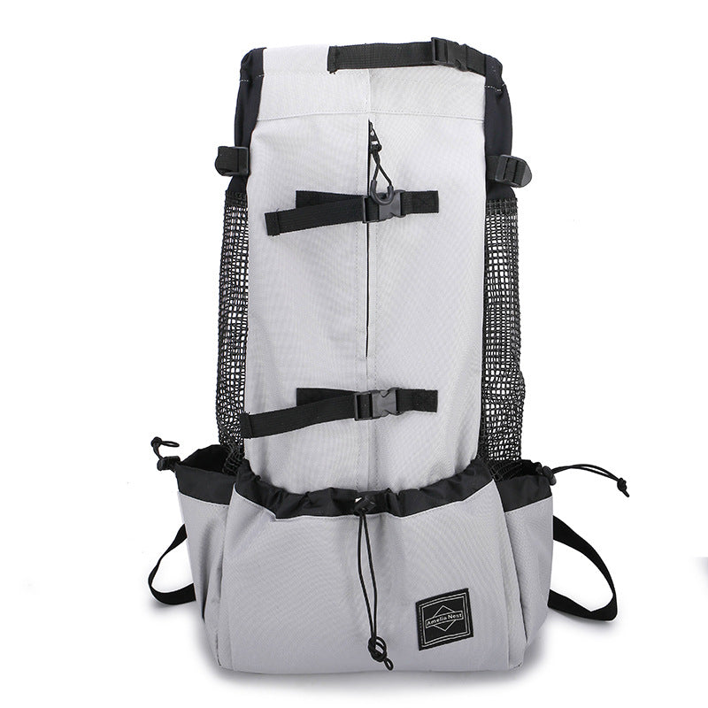 White pet dog carrier backpack with mesh side panels and black shoulder straps