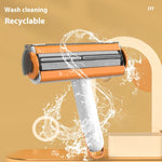 Washable lint roller with orange core, white handle, and water-spray effect