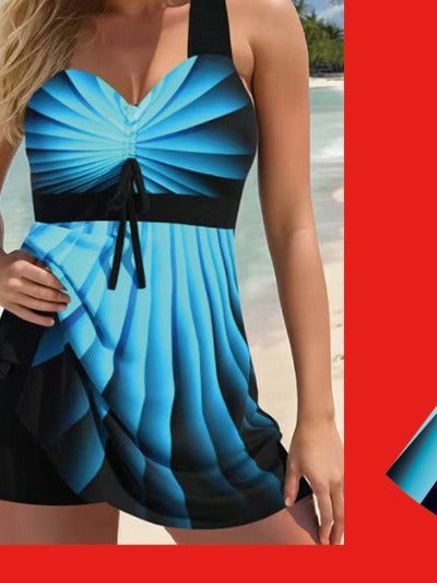 Women’s plus-size quick-dry swim skirt swimsuit with blue radial print top and black trim