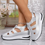 White platform wedge sandals with hook-and-loop straps and cutout toe