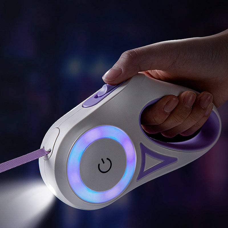 Purple retractable pet leash with LED light ring and white handheld controller