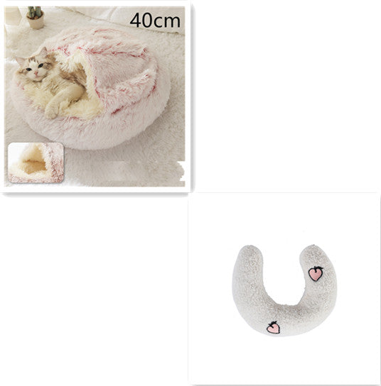 Half-moon plush bolster with gray fabric and small heart/face patches