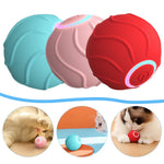 Set of interactive cat rolling balls in blue, pink, and red with glowing button