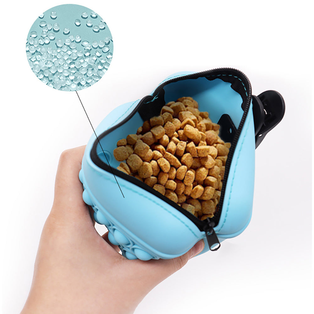 Blue silicone treat pouch with zipper top, open to show dog treats inside
