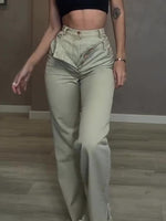 Light green high-waist denim jeans with button fly and front pockets