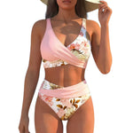 Pink floral wrap bikini set with high-waist bottoms and halter neck