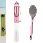 Pink portable dog water bottle with filter mesh and carrying strap, plus gray brush