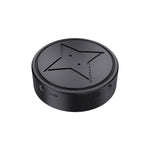 Black mini GPS tracker with strong magnet, top view showing star emblem and USB label