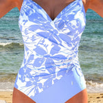 Backless drawstring tankini swimsuit with white-and-light-blue floral print