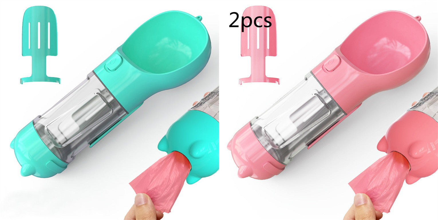 Portable pet water bottle feeder with teal and pink bowls, clear bottle, includes pink waste bag