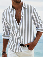 Men's striped button-up long-sleeve shirt with white and dark gray vertical stripes