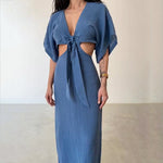 Women's sapphire blue maxi dress with tie-front V-neck and cutout shoulders, fitted long skirt