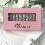 Press-on nails box showing silver rhinestone 3D crystal long nail row
