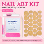 Nail art kit contents with glue, alcohol pad, cuticle stick, and nail file