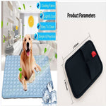 Blue cooling pad with pebble texture; golden dog on it beside a black pouch