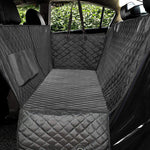 Black quilted dog car seat hammock cover for rear back seat, with attached straps
