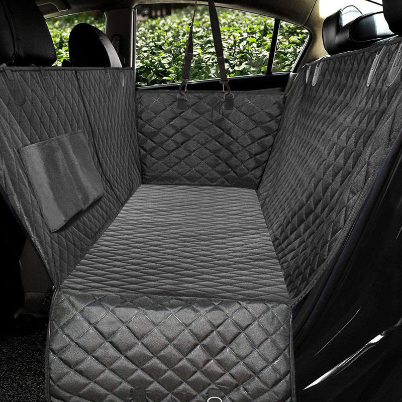 Black quilted dog car seat hammock cover for rear back seat, with attached straps