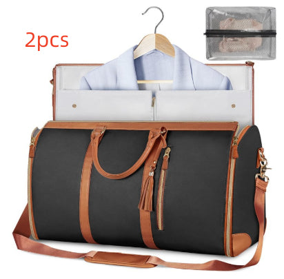 2-piece waterproof travel duffel set, black bags with tan handles and zipper tassels