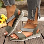 Fish-mouth wedge sandals with elastic ankle strap and jute-textured sole, olive green.
