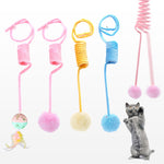 Cat spring toy set with pink, yellow, and blue coils plus plush pom balls