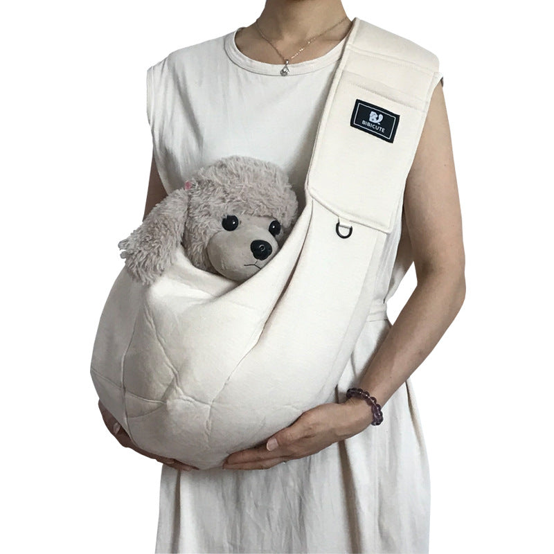 Off-white pet shoulder carrier sling bag with front pouch and adjustable strap