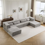 Light grey modular sectional sofa with ottomans, chaise and ottoman bench view