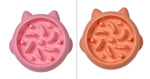 Slow feeder pet bowl set with cat-face lids, pink and orange, raised anti-gulp bumps