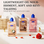 Cocoa body oil bottle with blue cap on display with other body oils