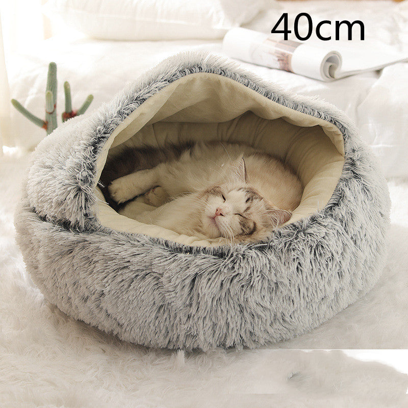 Round gray plush pet bed with beige-lined open nest for pets