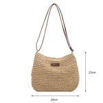 Beige woven straw shoulder tote with dark brown trim, zipper top; size markings shown