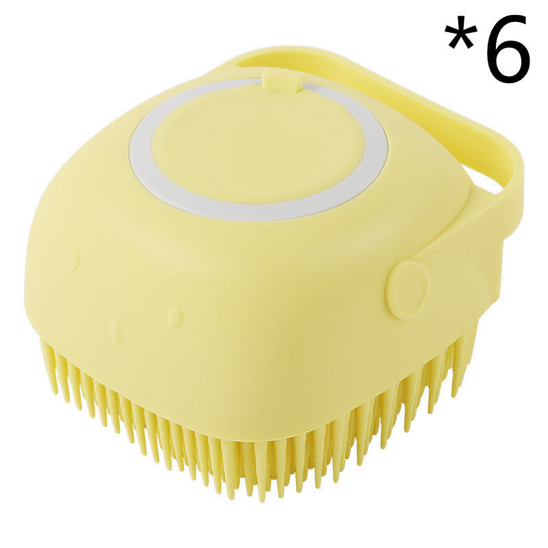 Yellow silicone pet bath massage brush with round head and soft bristles