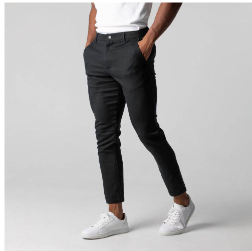 Black slim-fit business trousers with button waistband, tapered straight legs, side pockets