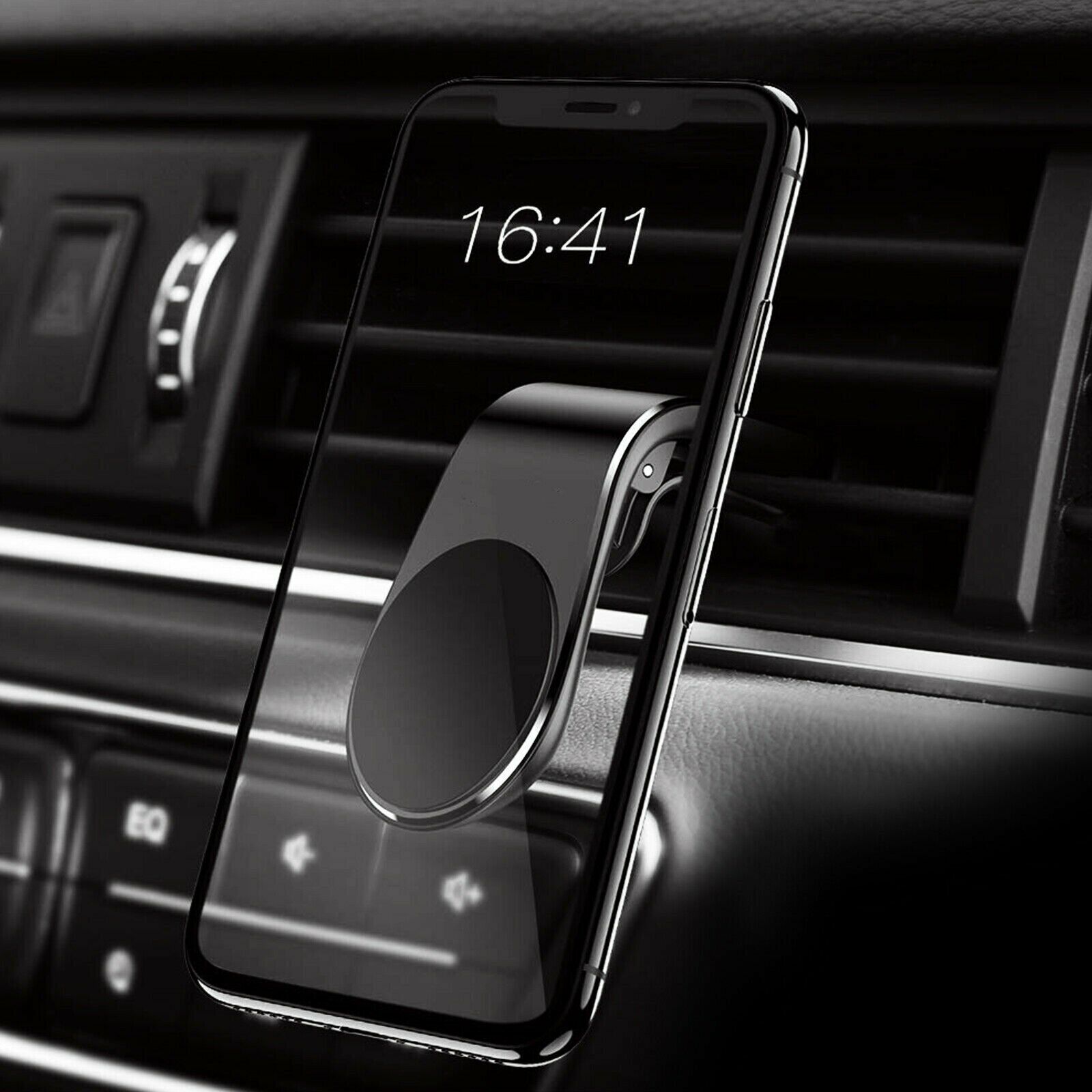 Magnetic car phone holder with vent clip and slim black ring mount on dashboard