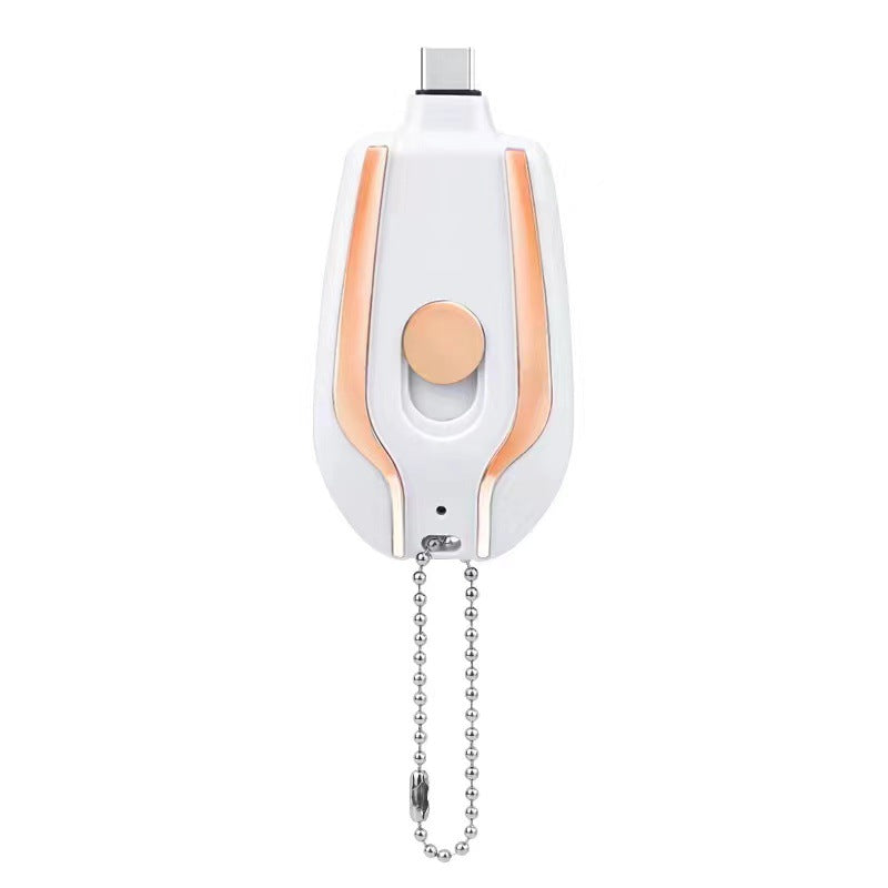 White and orange keychain power pod charger with bead chain, round front button and LED