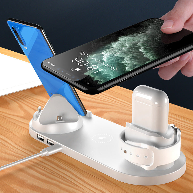 Wireless charging dock station with phone stand, smartwatch, and white earbuds charging holder