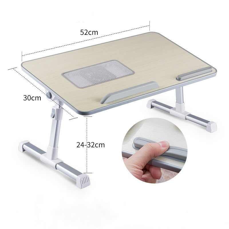 Adjustable foldable laptop desk stand with 52cm x 30cm top and adjustable legs 24–32cm