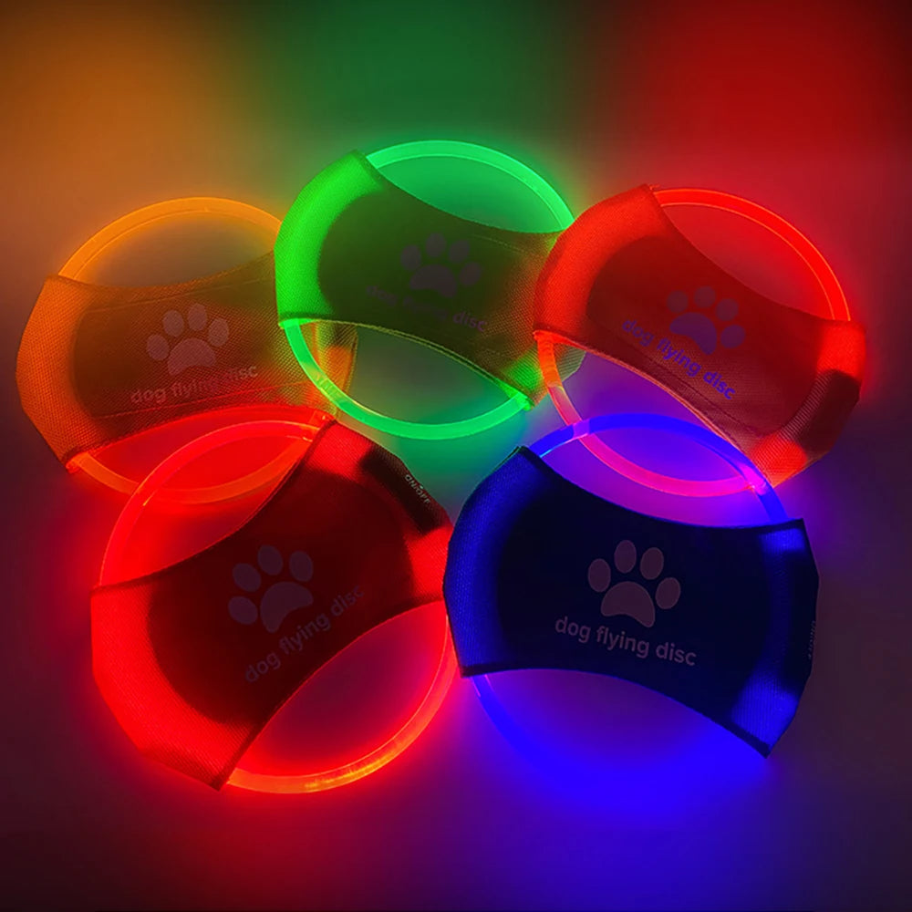 LED dog flying disc set, green, red, blue, and orange glowing rings
