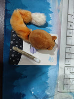 Plush long-tail mouse toy with brown body and white tail tip in blue blister pack