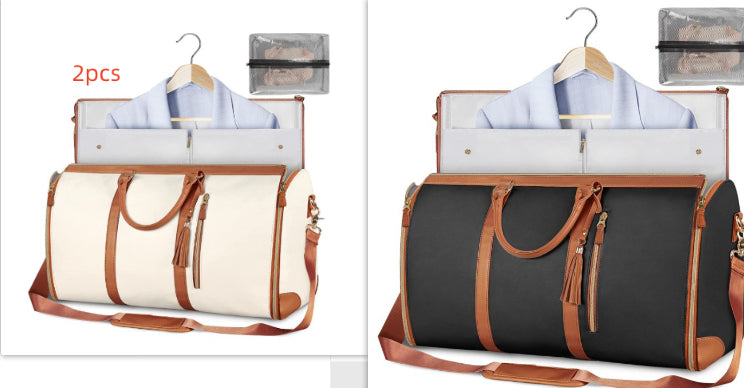 Waterproof travel duffle set, white bag with brown straps and dark bag with tan trim