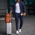 Men's navy zip-up jacket with long sleeves and drawstring sweatpants set