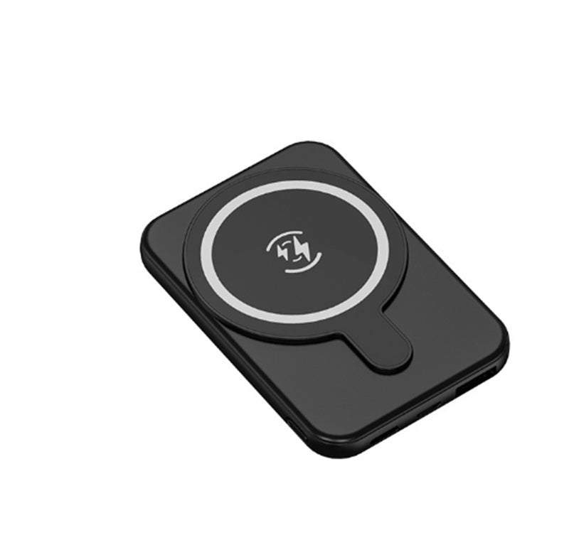 Black magnetic wireless power bank with circular wireless contact on a slanted angle