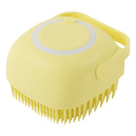 Yellow silicone pet bath massage brush with round pad and short rubber bristles