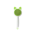Self-cleaning pet grooming brush with green bristle pad, white handle, and cat-ear grip