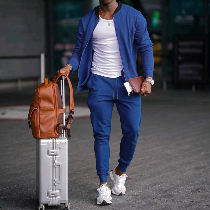 Men's zip-up long sleeve jacket and drawstring sweatpants set in blue, with tapered legs